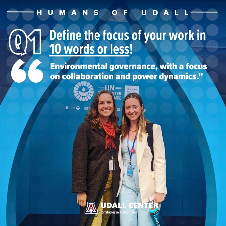 Dr. Gulson poses with a friend inside the outline of a water droplet at at UN Water Conference.