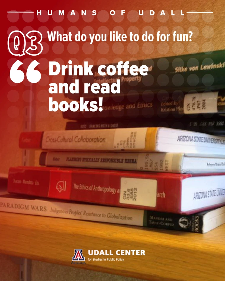 A photo of a stack of books in Naomi's office.