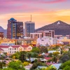 The downtownTucson skyline at sunset with A mountain in the background